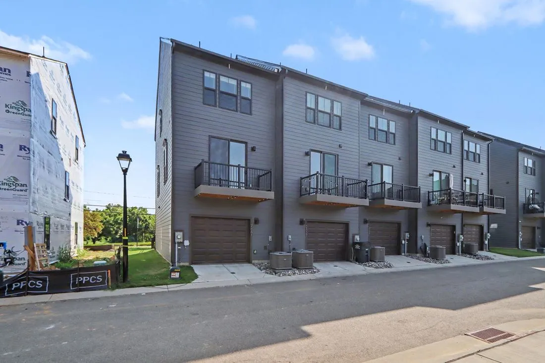 Street view of the home and garage