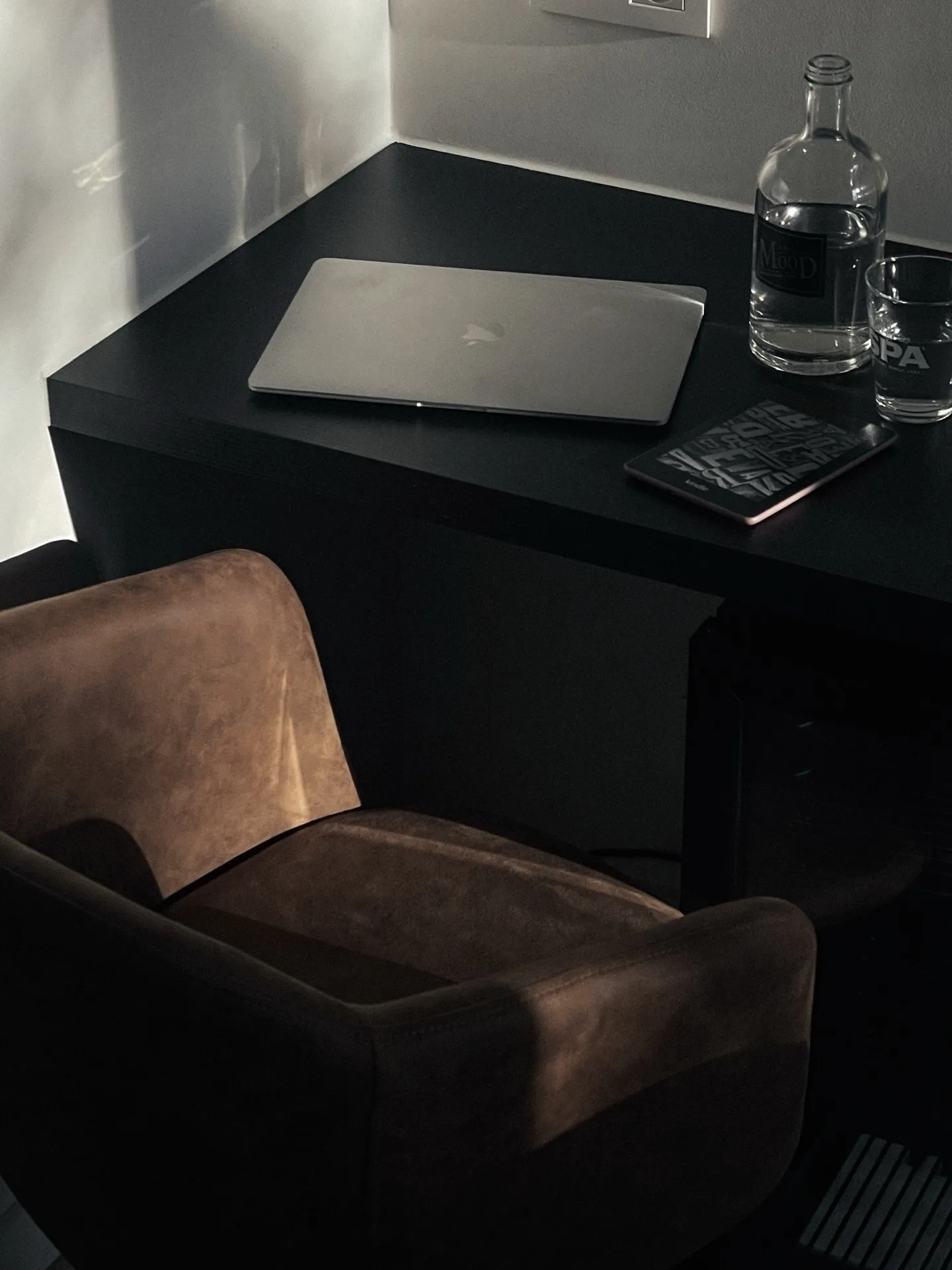 A desk and chair, the kind of quiet space where a down payment plan actually gets mapped out